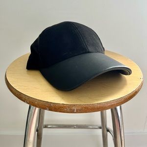 Wilfred Free leather and suede cap.